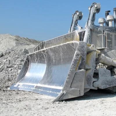 Enstruc U blade bulldozer attachment working in a limestone quarry for high-volume material handling