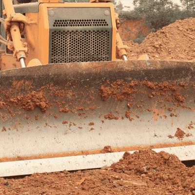 Straight dozer blade fitted to Caterpillar bulldozer for fine grading and material control